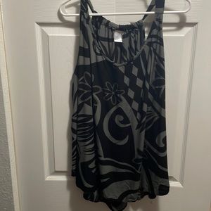 Hawaiian adjustable tank top. V neck, flowy, rounded bottom